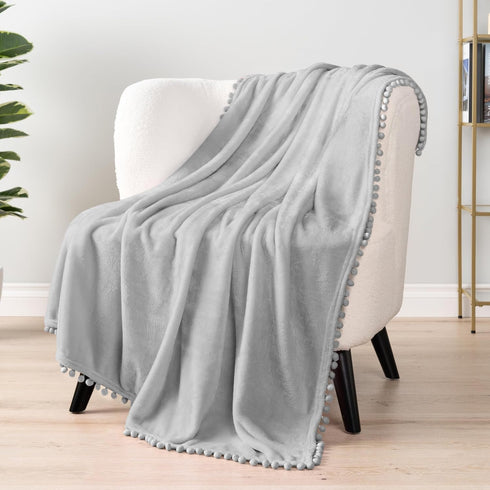 PAVILIA Fleece Throw Blanket for Couch with Pom Pom Fringe, Light Grey, Soft Cozy Fuzzy Flannel Blanket for Sofa Bed, Large Lightweight Plush All ...