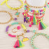 Make It Real: Neo-Brite Chains & Charms Kit - Create 10 Unique Cord & Tassel Charm Bracelets, 195 Pieces, includes Play Tray,DIY Playful Charm & J...