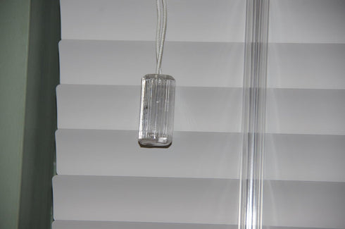 Window Blind Parts. Safe Horizontal Blind Pull Cord Tassel, Cylinder Shape. Breakaway Knob That Will Separate When Excess Pressure is Applied. Gre...