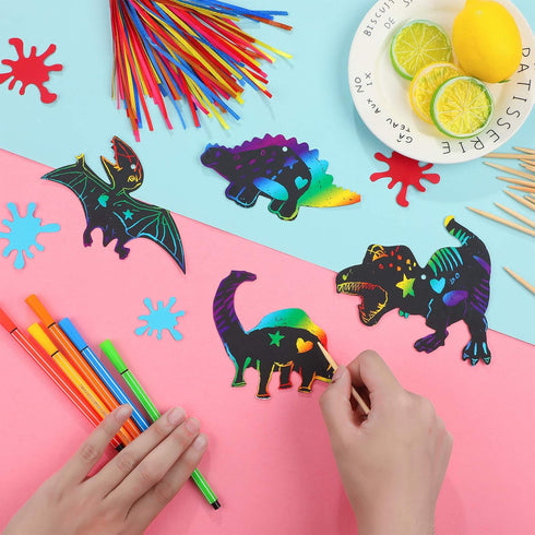 Outus 120pcs Scratch Dinosaur Craft Art Kits for Kids with 48 Scratch Dinosaur Paper24 Wooden Styluses and 48 Ribbons for Theme Birthday Party Gam...