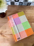 DesignWorks Ink Jumbo 7.5" x 10.25" Notebook Journal with 200 Lined Pages, Ribbon Marker, and Pockets, Velvet Rainbow Check...