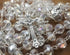 Nazareth Store White Clear Crystal Beads Rosary Prayer Beaded Necklace with Holy Soil Medal and Jesus Cross Communion Rosary...