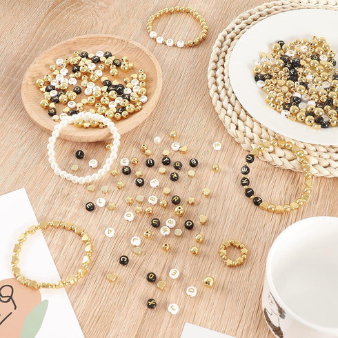 Whaline 1500Pcs Gold Spacer Beads Kit 10 Styles Bracelets Making Beads Assorted Gold White Black Spacer Beads Star Flat Beads Alphabet Letter Bead...