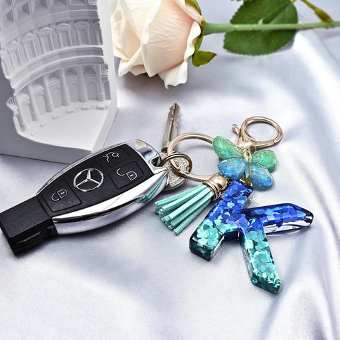 JINGUAZI Initial letter Keychains for Women Tassel Butterfly Pink Purple Cute Car Keychain for Wallet Backpack bag charm...