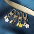 4 PCS Cute Flower Keychains Aesthetic Keychain Charms Daisy Keychain Enameled Keychains Mini Keychain Earphone Case Accessories Keyrings and Keych...