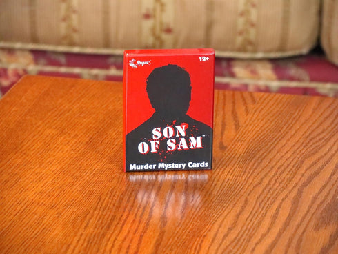 Regal Games - Son of Sam - Murder Mystery Card Game - for Holidays, Game Nights, and Parties - 5”x 2” card size - 54 Count - Up to 26 Players, Age...