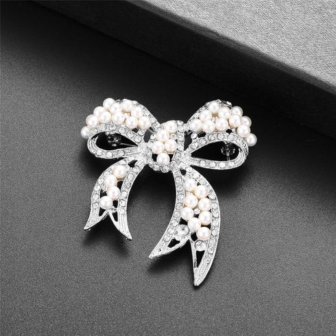 Nicole Miller Silver White Round Pearls Ribbon Clear Rhinestones Brooches and Pins...