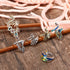 Syhood 6 Pieces Knitting Loop Crochet Ring Adjustable Knitting Loop Ring Peacock Open Finger Holder Thimble Metal Yarn Guide Finger Holder for Qui...