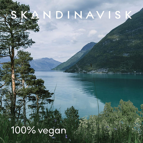 Skandinavisk KOTO 'Home' Mini Scented Candle. Fragrance Notes: Vanilla Beans and Dried Orange Peel, Amber and Leather. 2.3 oz....