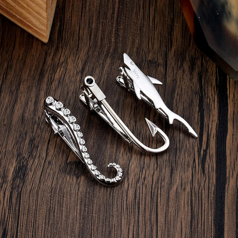 Sanfenly Tie Clips for Men Unique Personalized Cross Shark Fish Hook Sword Gun Guitar Octopus Limb Tree Compass Tie Bar Set...