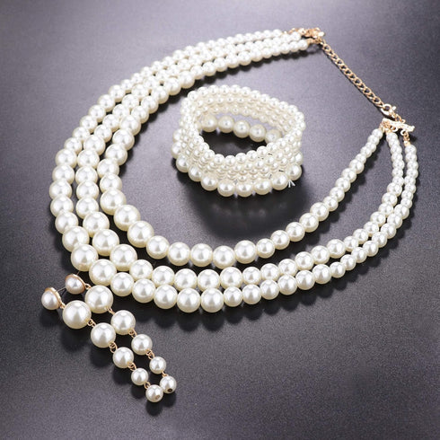 FINREZIO Women's Faux Three Multi-Strand Pearl Necklace Long Pearl Dangle Earrings and Bracelet Jewelry Set for Women...