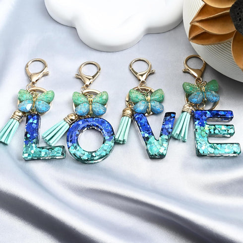 JINGUAZI Initial letter Keychains for Women Tassel Butterfly Pink Purple Cute Car Keychain for Wallet Backpack bag charm...