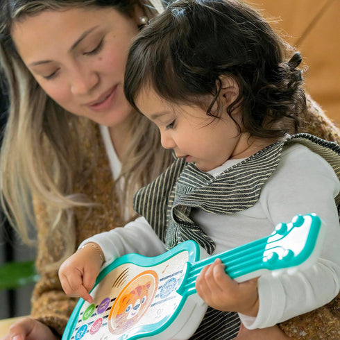 Baby Einstein Sing & Strum Magic Touch Ukulele Wooden Musical Toy, Ages 6 Months+, Multicolored...