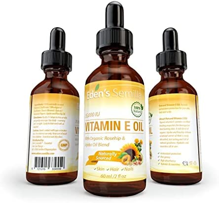 100% Plant Extract Vitamin E Oil 35,000 IU + Organic Rosehip & Jojoba Blend - 2 OZ Bottle. FAST Absorbing Skin Protection For Face & Body. Pure Ingredients - Ideal For Sensitive Skin - Use Daily