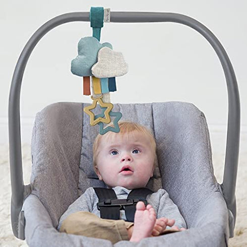 Itzy Ritzy Bitzy Bespoke Jingle Travel Toy for Stroller, Car Seat or Activity Gym; Features Jingle Sound, Hexagon Rings and Adjustable Attachment Loop, Cloud