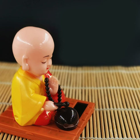 FAVOMOTO Little Monk Figurine Solar Head Toys Funny Car Shaking Head Toy Chinese Little Buddha Monk Statue Car Dashboard Ornament Home Decorations