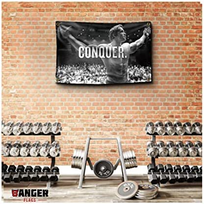 Banger Flags Banger - Original Arnold Schwarzenegger Conquer Motivational Inspirational Office Gym Wall Decor Design on a 3X5 Feet Flag with 4 Grommets for Easy Hanging. Authentic