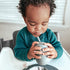 ez pz Mini Cup + Straw Training System - 100% Silicone Training Cup for Infants + Toddlers - Designed by a Pediatric Feeding Specialist - 12 Months+ (Blue)