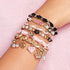 Make It Real - Juicy Couture Mini Chains and Charms - DIY Charm Bracelet Making Kit - Friendship Bracelet Kit with Charms, Beads & Cords - Arts & Crafts Bead Kit for Girls - Make 5 Bracelets