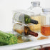 mDesign Plastic Free-Standing Wine Set Rack Storage Organizer for Kitchen Countertops, Pantry Cabinet, Fridge Organization - Holds Water Bottle and Alcohol Bottles - 4 Pack - Clear