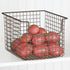 mDesign Metal Wire Food Storage Basket Organizer with Front Dip Opening for Organizing Kitchen Cabinets, Pantry Shelf, Bathroom, Laundry Room, Closets, Garage - Bronze