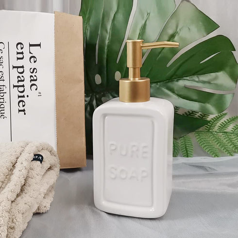 Decorative Soap Dispenser White Ceramic Lotion Bottle with Embossed Letters Noble Golden Matte Pump
