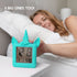Something Unicorn - Unicorn Digital Alarm Clock with Snooze Button and Blue LCD Back-Lighting. Easy to Set Battery Powered Digital Clock in Silicone Sleeve with Time, Date and Alarm Display. (Blue)