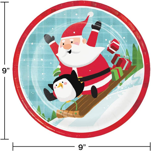 Fun with Santa Themed Party Supplies | Bundle Includes Paper Plates and Napkins for 16 People Plus Tablecover | Santa and Penguins Design