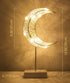 Lewondr Table Lamp, Battery Powered Moon Shape Bedside Light Desk Lamp Christmas LED Decorative Lamp Winding Iron Frame Plastic Base Warm White Bright Light Home Bedroom Romantic Decoration - White