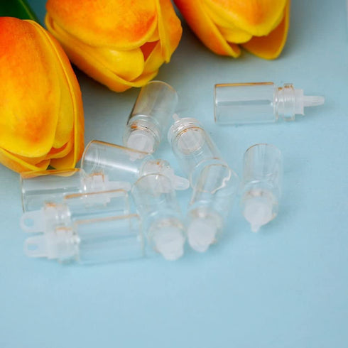 ORYOUGO 50Pcs 1ML Mini Cute Glass Message Bottles with Plastic Stoppers,DIY Decoration Wishing Bottles for Weddings Party Favors