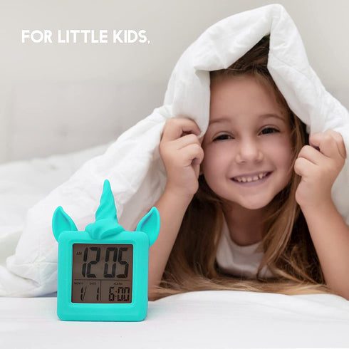 Something Unicorn - Unicorn Digital Alarm Clock with Snooze Button and Blue LCD Back-Lighting. Easy to Set Battery Powered Digital Clock in Silicone Sleeve with Time, Date and Alarm Display. (Blue)