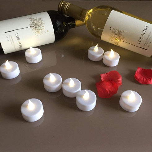 VETOUR Flameless Tea Lights Candles Realistic LED Flickering Operated Tea Lights Steady Battery Tealights Long Lasting Electric Fake Candles in White 24pcs Decoration for Party and Gifts Ideas