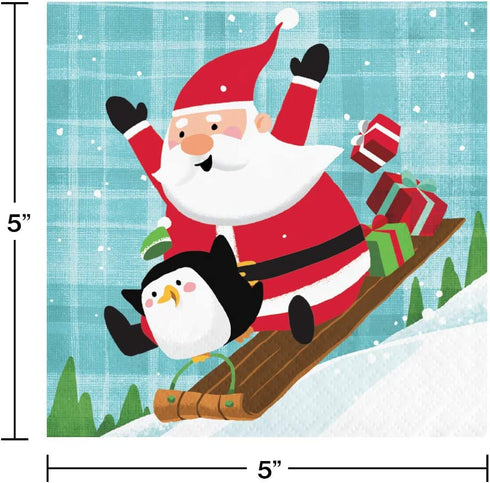 Fun with Santa Themed Party Supplies | Bundle Includes Paper Plates and Napkins for 16 People Plus Tablecover | Santa and Penguins Design