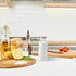 UPKOCH Ceramics Oil Bottles Ceramics Dispenser Bottle Olive Oil Soy Sauce Vinegar Cruet Liquid Condiment Storage Can for Kitchen Cooking (White) 400ML