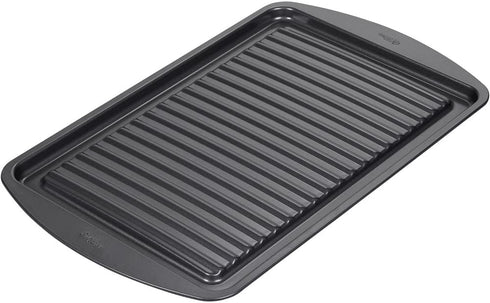 Wilton Perfect Results Premium Non-Stick Bakeware, Oven Griddle Pan, Great for Preparing Bacon and Sausages in the Oven, 10.25 x 15.25 Inches