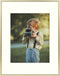 Frametory, 11x14 Metal Picture Frame - Aluminum Thin Molding - Photo Frame with Ivory Color Mat for 8x10 Wall Art & Pre-Installed Mounting Hardware - Real Glass (Gold, 1 Pack)