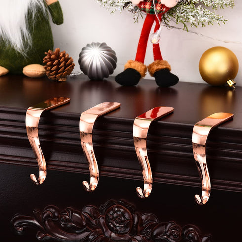 Yuokwer Set of 4 Christmas Stocking Holders for Mantel Stocking Hooks Hanger for Fireplace Christmas Safety Hang Grip Stockings Clip for Christmas Party Decoration (Rose Gold, Pack of 4)