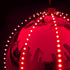 Alpine Corporation Hanging Christmas Ball Ornament with Chasing LED Lights, Plug-in Festive Indoor Holiday D©cor - 13-Inch - Red