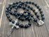 Nazareth Store Black Matte Agate Beads Rosary with Hematite Stones Catholic Necklace Jerusalem Holy Soil & Cross Crucifix in Velvet Bag