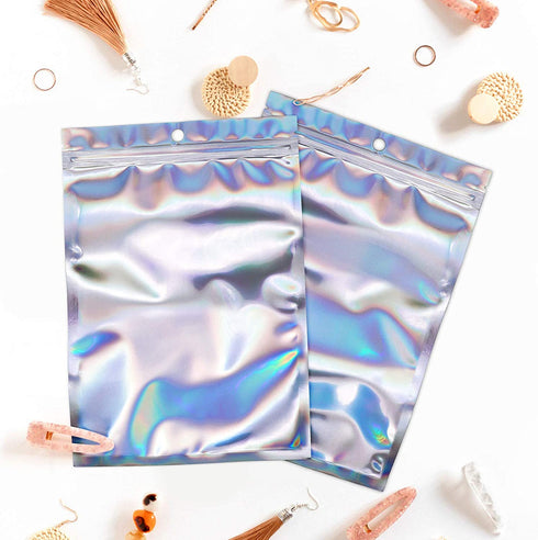 100 Counts Resealable Smell Water Proof Bags Foil Pouch Bag Flat Ziplock Bag with Clear Window for Party Favor Food Storage Gifts Bags Goodie Bag Holographic Color, 5.5 x 7.8 Inches