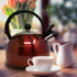2.5 Liter Whistling Tea Kettle - Modern Stainless Steel Whistling Tea Pot for Stovetop with Cool Grip Ergonomic Handle (Red)