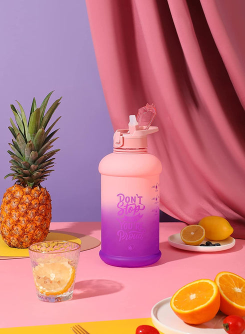 H2O Capsule INSPO Half Gallon Water Bottle with Time Marker and Straw Motivational Hydration Tracker Jug for Daily Intake Big BPA-Free FoodSafe Leakproof Drinking Bottle Handle & Strap, Purple Peach