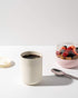 W&P Porter Ceramic Mug w/ Protective Silicone Sleeve, Cream 12 Ounces | On-the-Go | Reusable Cup for Coffee or Tea | Portable | Dishwasher Safe