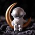 Amosfun Astronaut Figurine Resin Moon Spaceman Model Ornament Car Interior Figure for Astronaut Party Cake Topper Table Decoration (Gold)