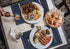 WEHVKEI Navy Blue Placemats for Dining Table Set of 6, Waterproof Wipeable PU Leather Place Mats Indoor, Washable Kitchen Table Mats for Easter Thanksgiving Christmas New Year Party Home Decor