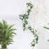 AGEOMET 2pcs Artificial Eucalyptus Garland with Flowers Greenery Garland Willow Vines White Rose Garland, Faux Silver Dollar for Fireplace Mantle Table Wedding Party Garden Boho Room Decor