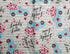 Delivering Loads of Love Valentine's Day Vinyl Tablecloth with Blue Pick Up on White and Gray Striped Background - Flannel Backing (52" x 70" Oblong)