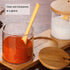 Hniuyun Condiment Container Seasoning Box Set, Glass Condiment Canisters Pots, Salt Sugar Spice Coffee Jar with Bamboo Wooden Spoon Lid and Base, Set of 3