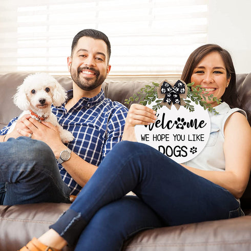 Dog Welcome Sign We Hope You Like Dogs Front Door Wreath Rustic Puppy Wooden Door Hanger with Greenery Paw Prints Bow for Dog Lovers Farmhouse Housewarming Gift Home Wall Art Decor 12 Inches (White)