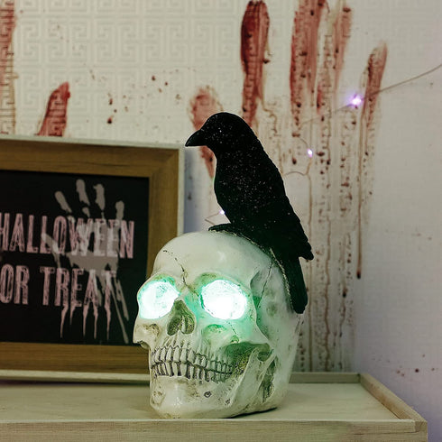 DR.DUDU Raven on Skull Halloween Decoration with LED Lights, Gothic Crow Perching on Skeleton Resin Figurine Haunted House Statue for Tabletop Desk Home Office Decor
